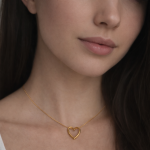 golden heart and clam gaze pendant